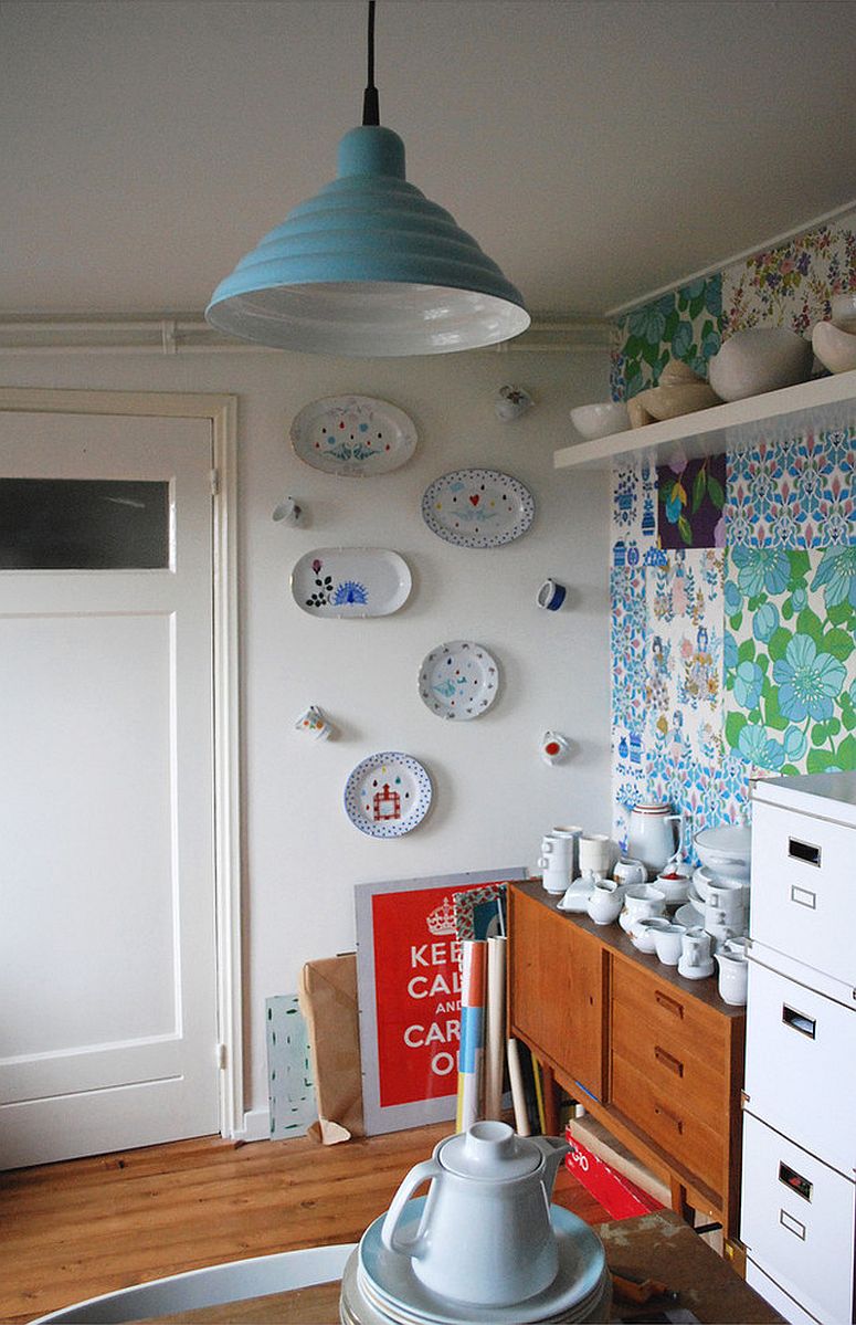 Small-home-office-with-patchwork-wallpaper-section-that-serves-as-accent-wall