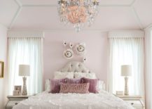 Sparkling-chandelier-draws-your-eye-instantly-in-this-white-bedroom-217x155