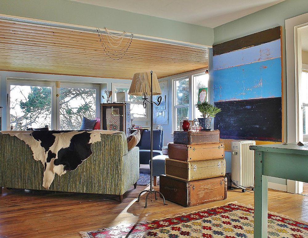 Stacked suitcases and trunks in the corner for the shabby chic living room