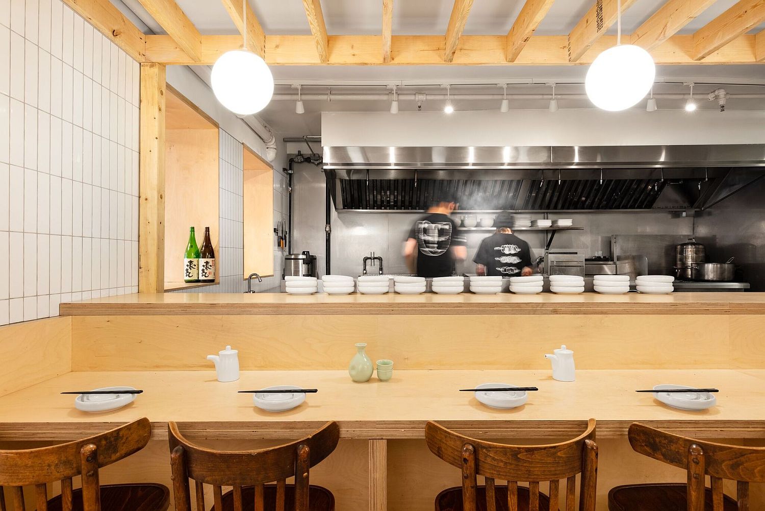 Stainless steel backdrop of the diner with wood all around