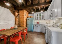 Adding-color-to-the-white-and-wood-farmhouse-style-kitchen-with-brick-and-tiled-sections-217x155