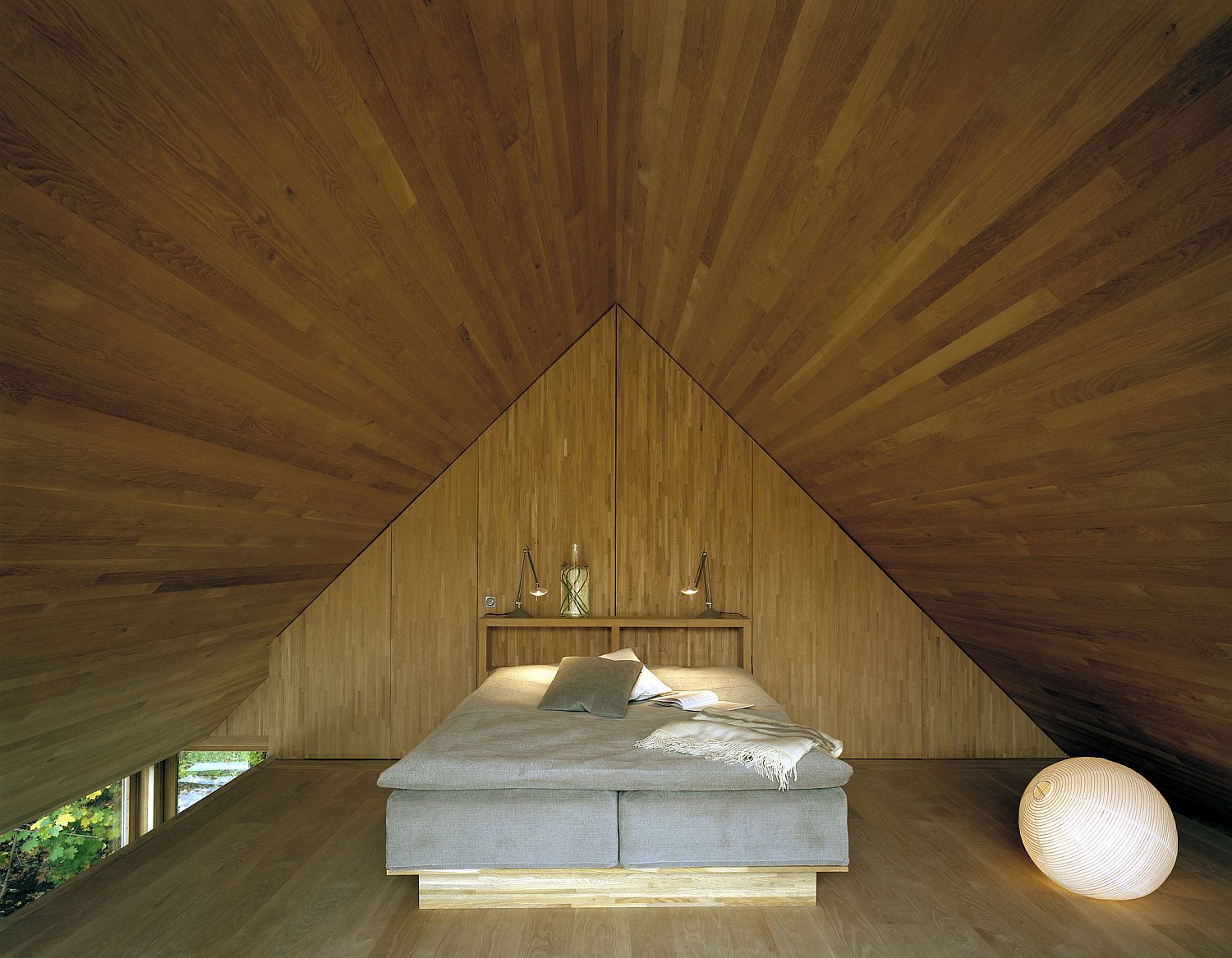 Attic bedroom feels serene and magical as it takes you into a minimal world