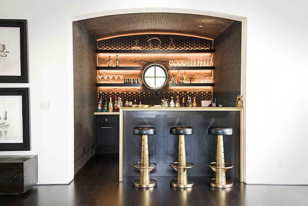 Beautifully-lit-shelves-and-backdrop-create-an-exquisite-home-bar-within-a-lovely-little-niche