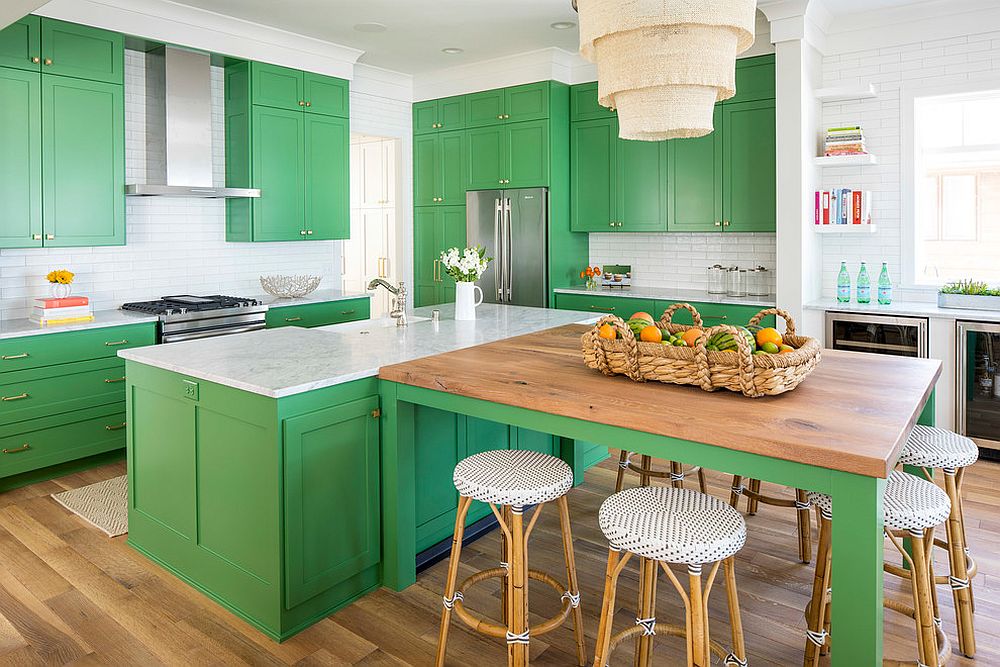 Beach style kitchen in white with green cabinets and island and smart countertops