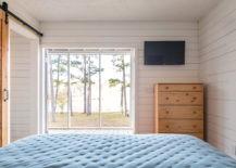 Bedroom-of-the-tiny-house-with-a-wonderful-view-of-the-woods-217x155