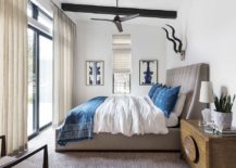 Bedroom-that-veers-more-towards-modern-than-rustic-217x155