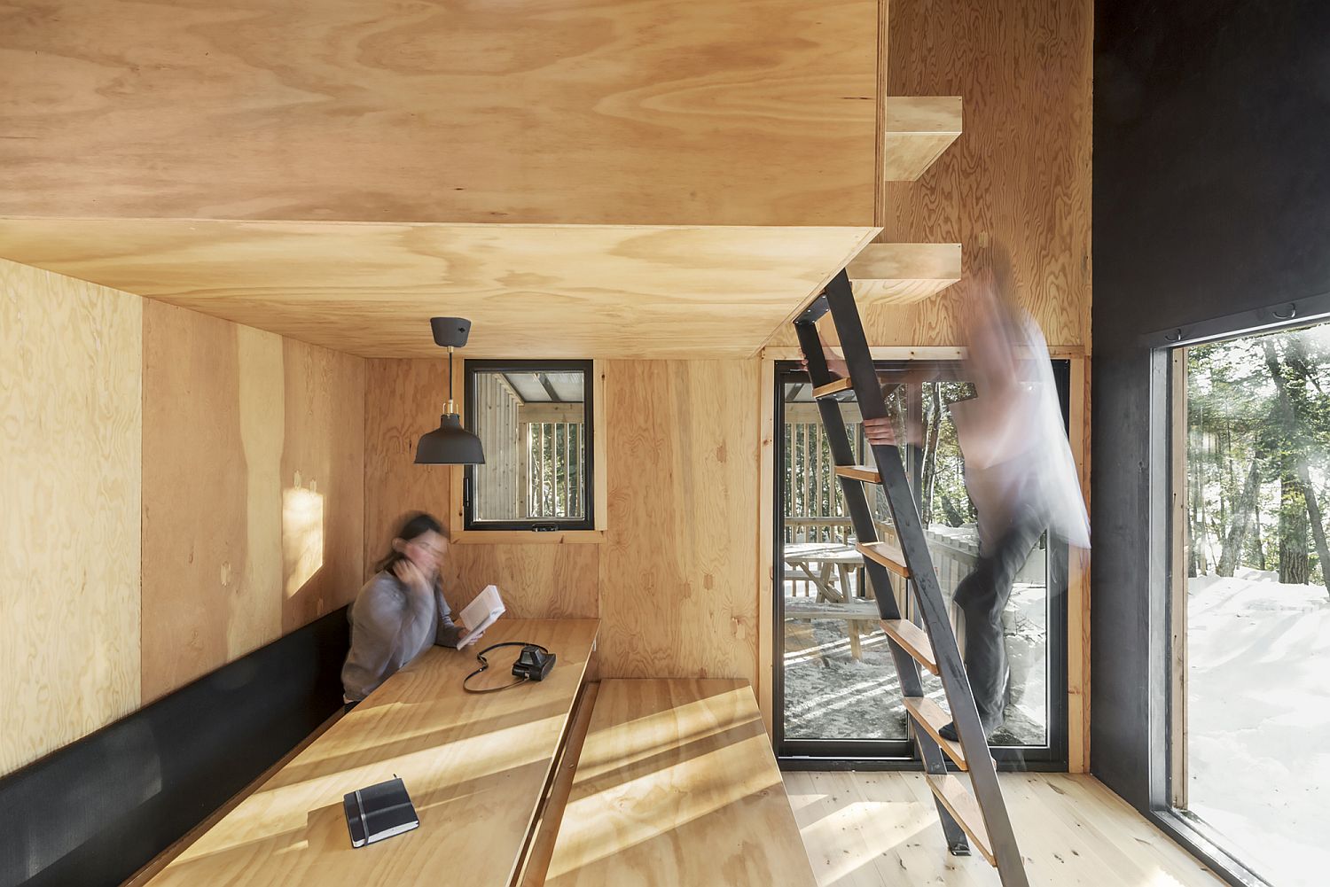 Bench on the lower level of the cabin can be easily converted into an additional bed