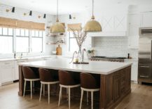 Bold-pendants-add-metallic-brilliance-to-the-kitchen-in-white-and-wood-217x155