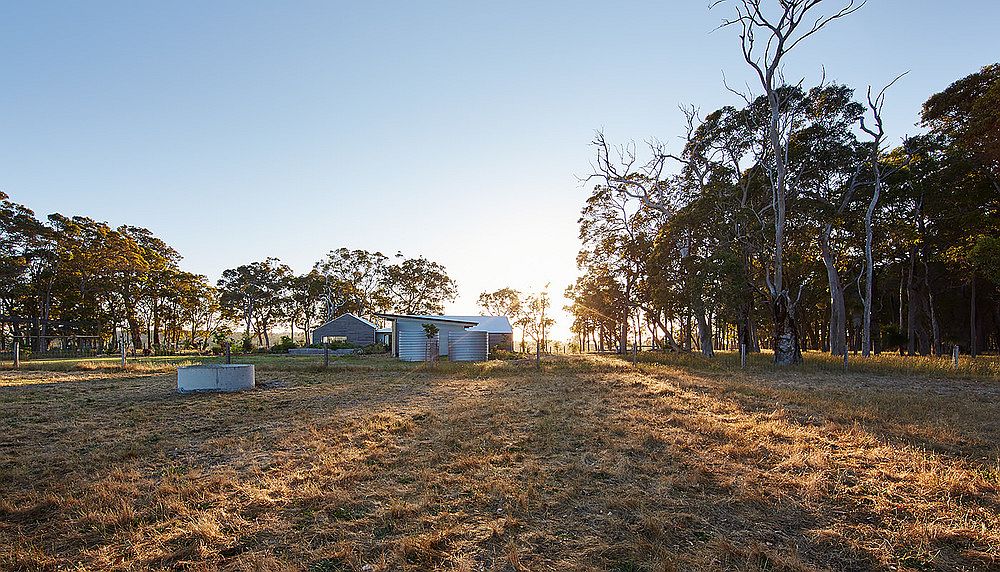 Bushland landscape around the farm house adds to its charming traditional appeal