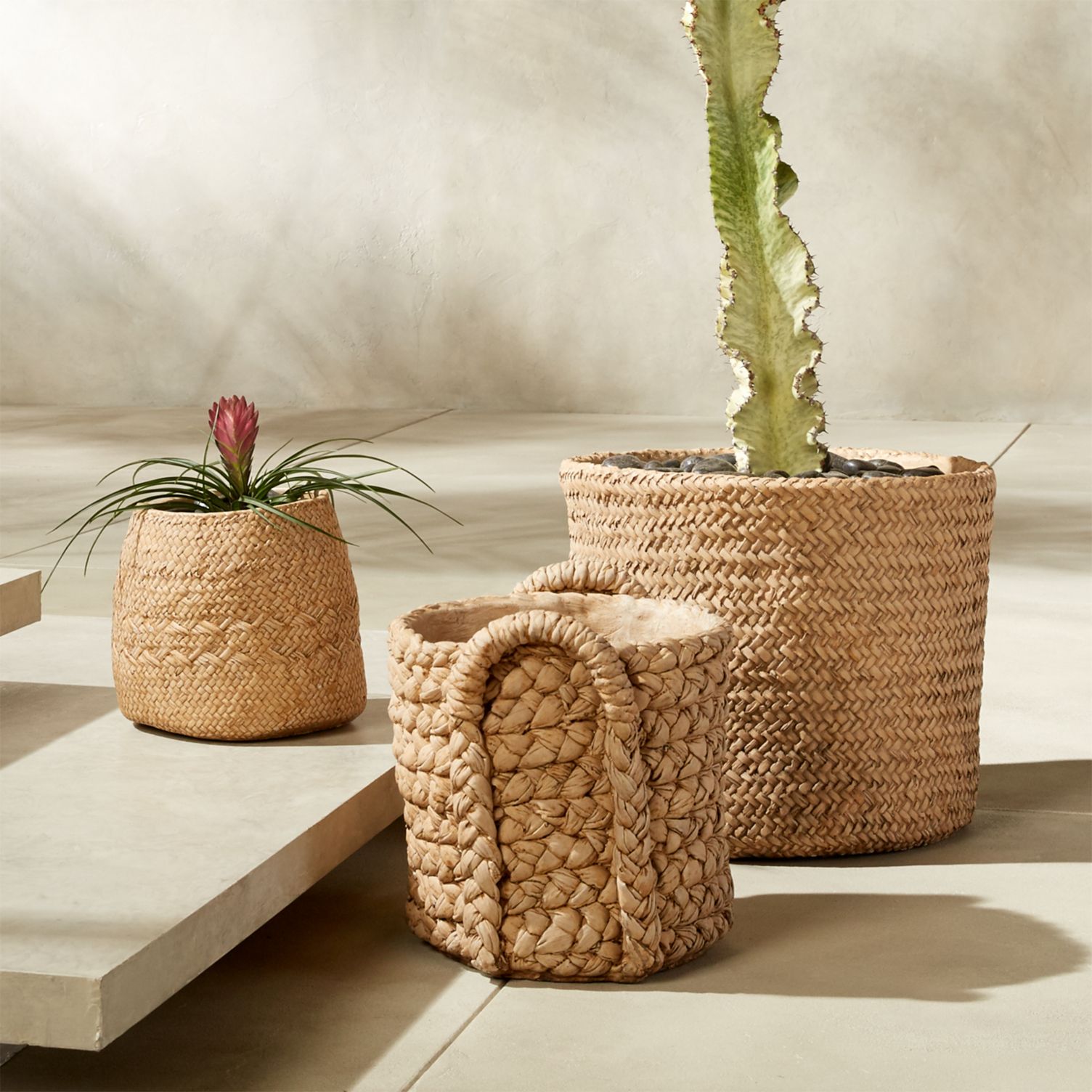 Cement planter baskets with a woven look
