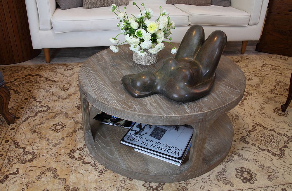 Coffee table in the sitting room with custom sculpture