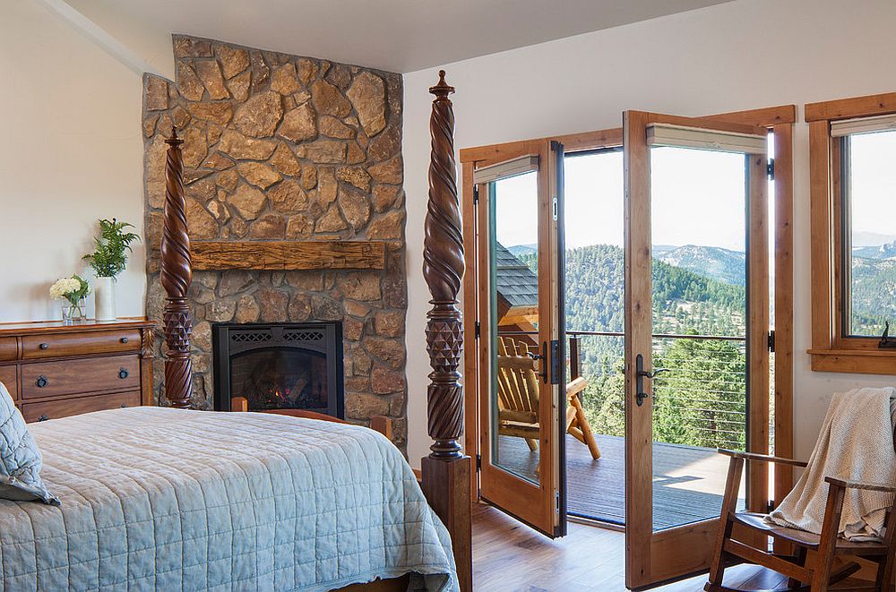 Corner fireplace in the rustic bedroom with stone finish