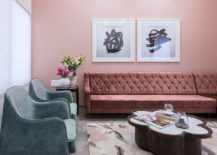 Exquisite-modern-living-room-in-pik-that-features-sectional-in-matching-pink-hue-217x155