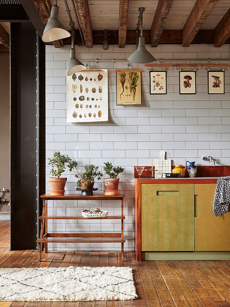 Industrial kitchen with unique gallery wall that feels casual and organic