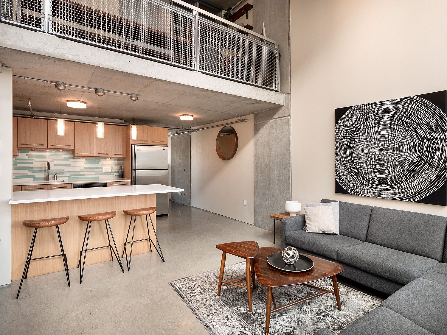 Kitchen and dining area next to the living space on the lower level