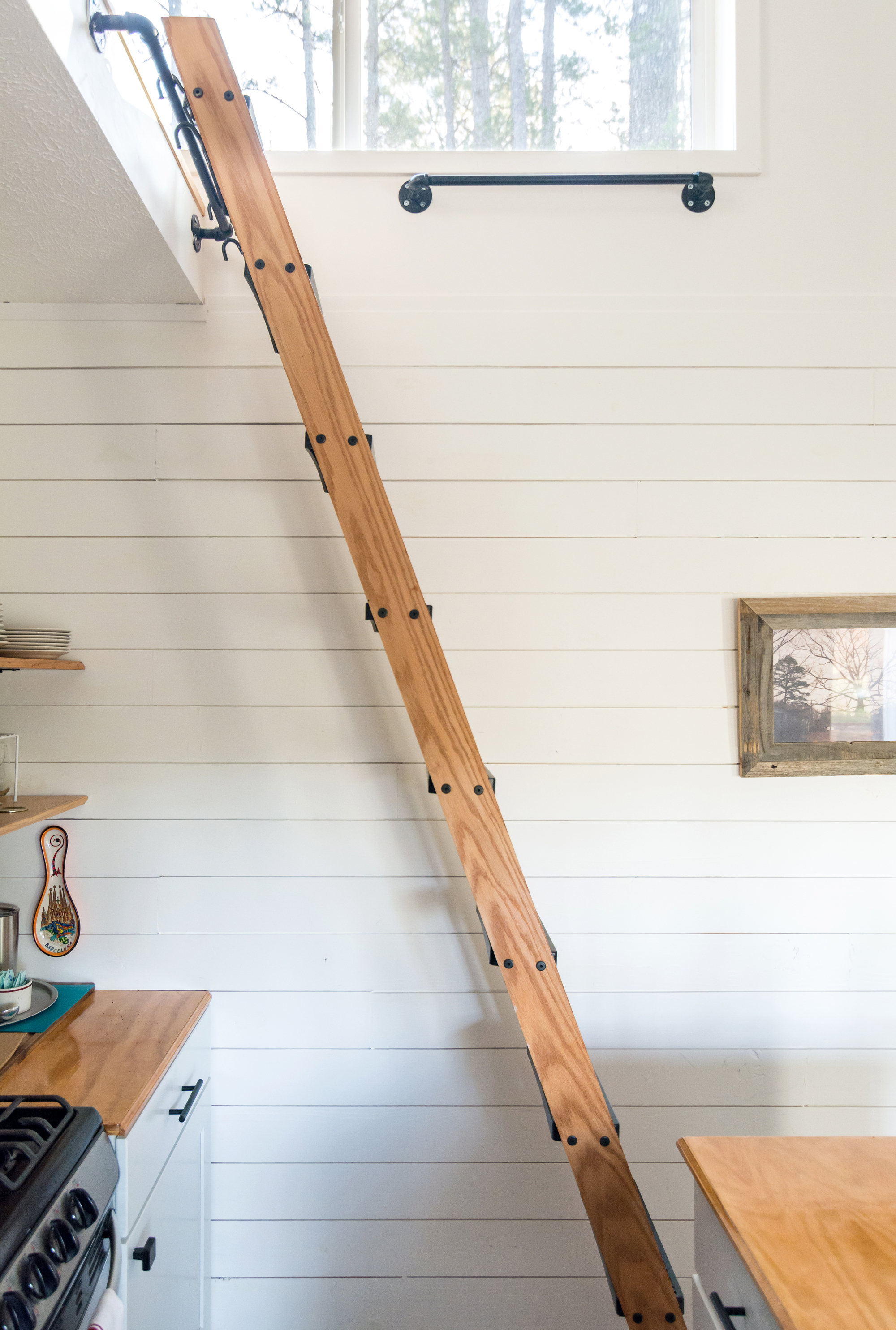 Ladder to access the upper level loft sleeping area