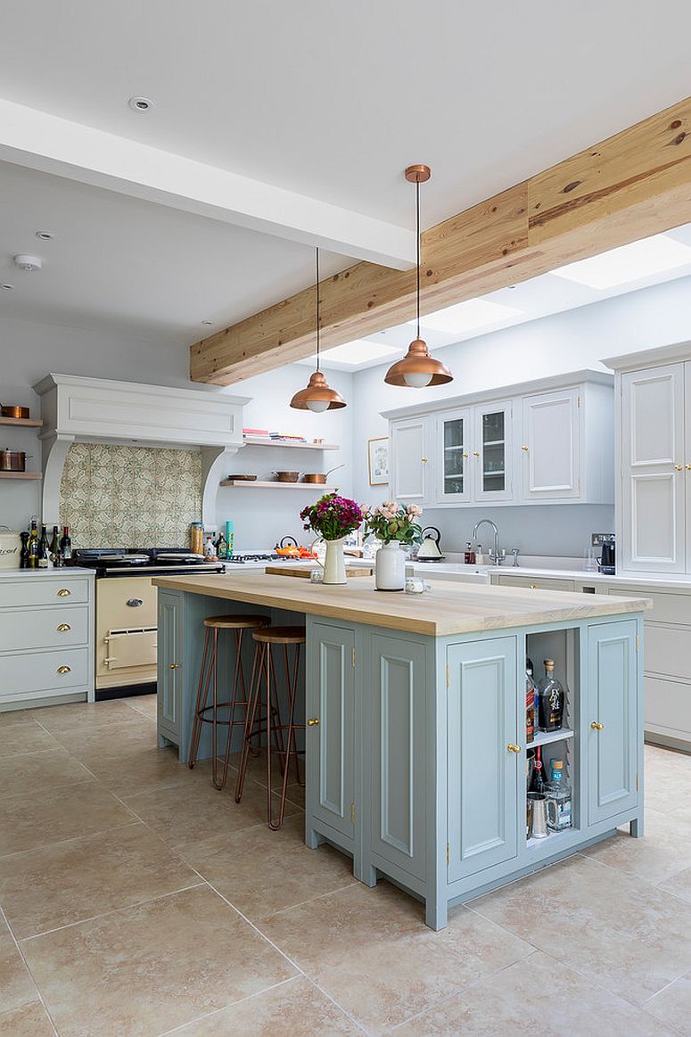 Light blue kitchen island fits perfectly into the wood and white theme