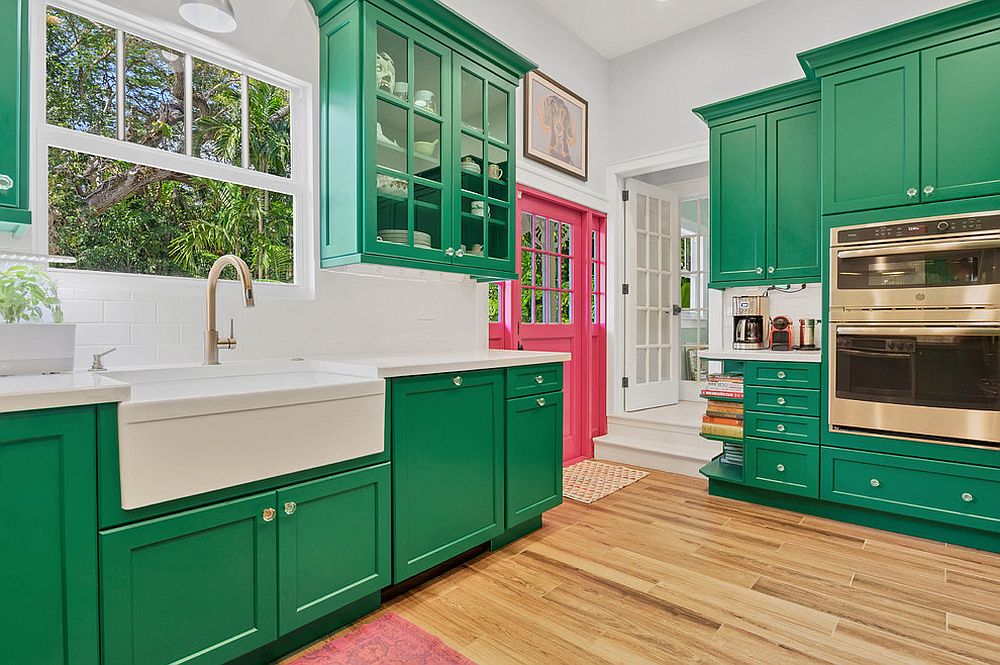 Lovely-use-of-green-cabinets-in-the-white-contemporary-kitchen-with-ample-natural-light