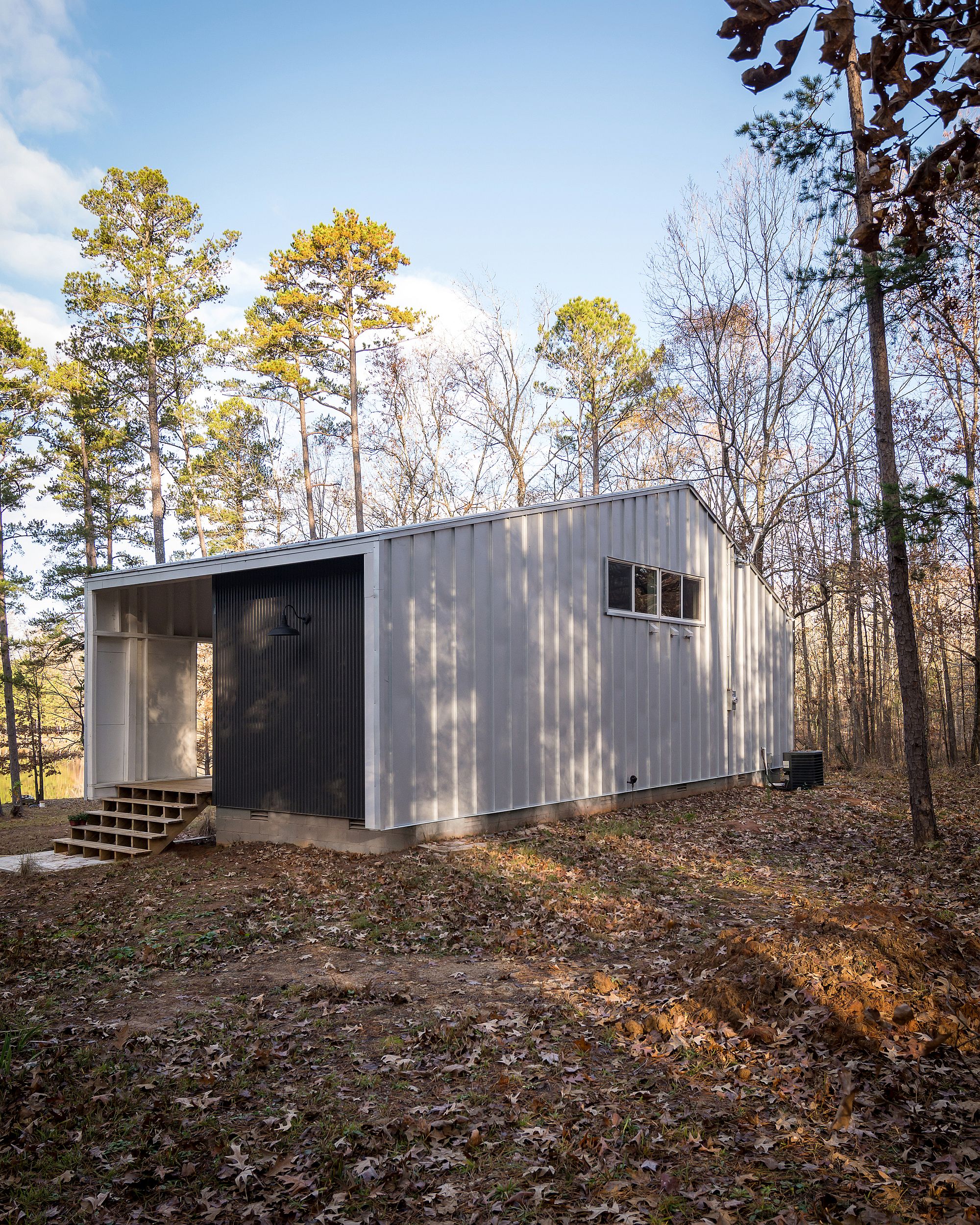 Metal panels create a cool cabin in the woods