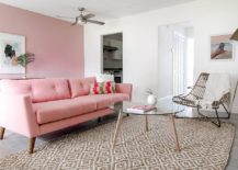 Midcentury-living-room-with-pink-accent-wall-and-a-matching-couch-217x155