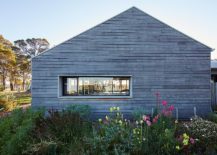 Oiled-timber-cladding-shapes-the-exterior-of-the-house-217x155