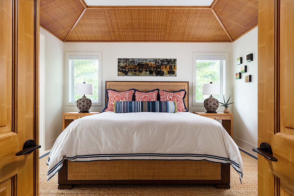 Organic finsihes and fabric take this tropical bedroom in wood and white to a whole new level!