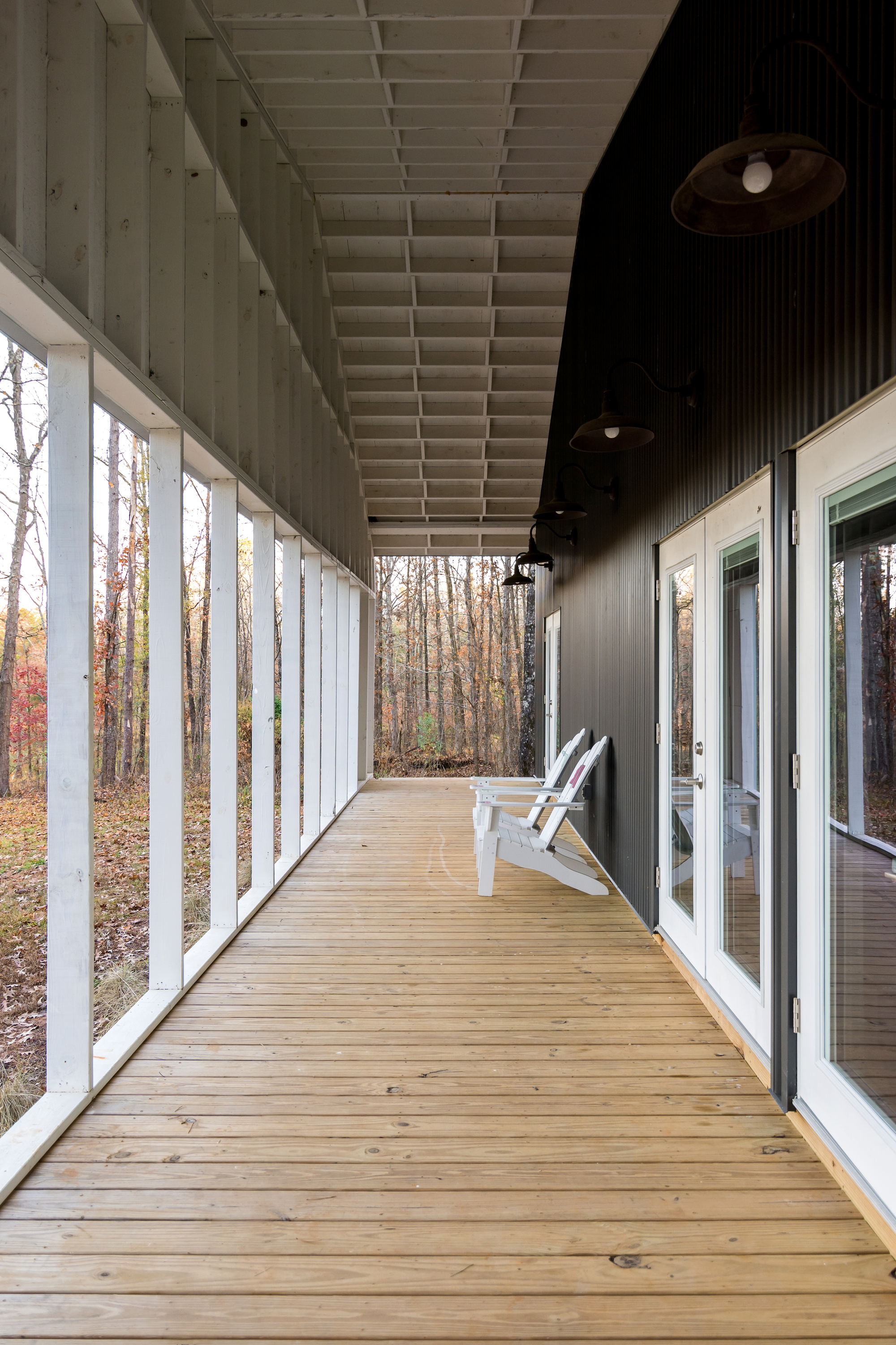 Porch around the house offers ample sitting space for everyone