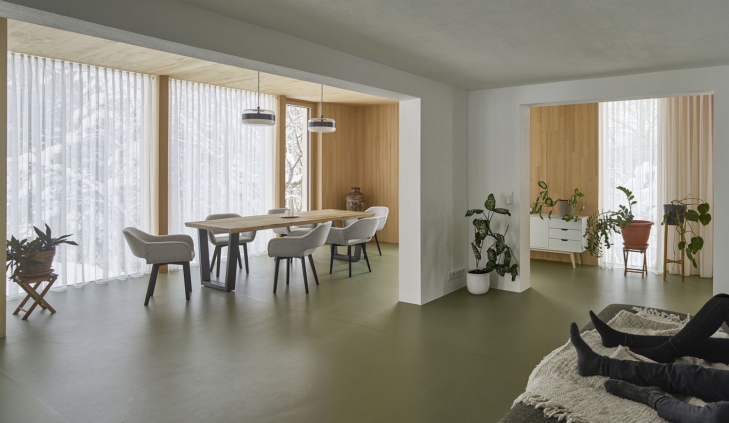 Revamped interior of the Austrian home in glass and wood