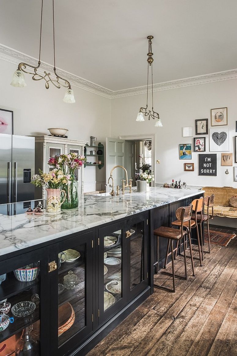 Shabby chic style kitchen with eclectic gallery wall in the corner