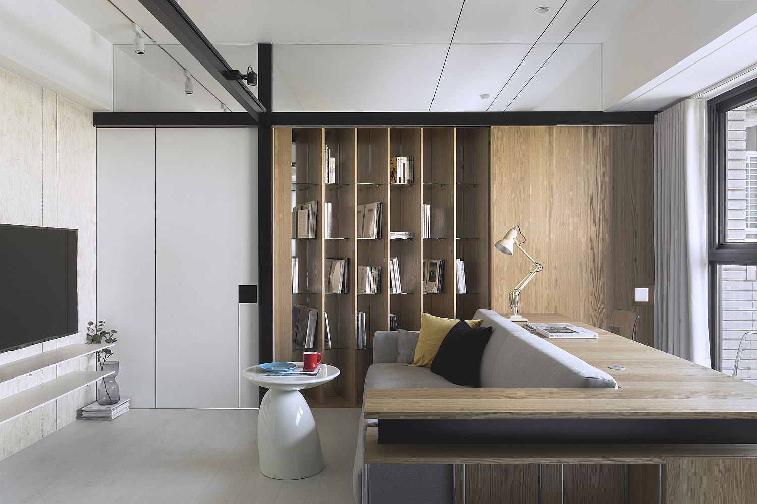 Sliding doors save space while shaping a smart contemporary interior