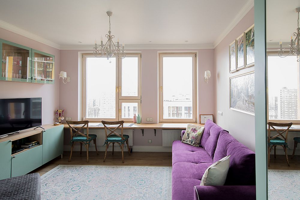 Small living room of Moscow apartment in pink with ample natural light