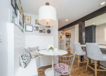 Space-above-the-banquette-breakfast-nook-used-to-add-gallery-wall-to-the-kitchen-217x155