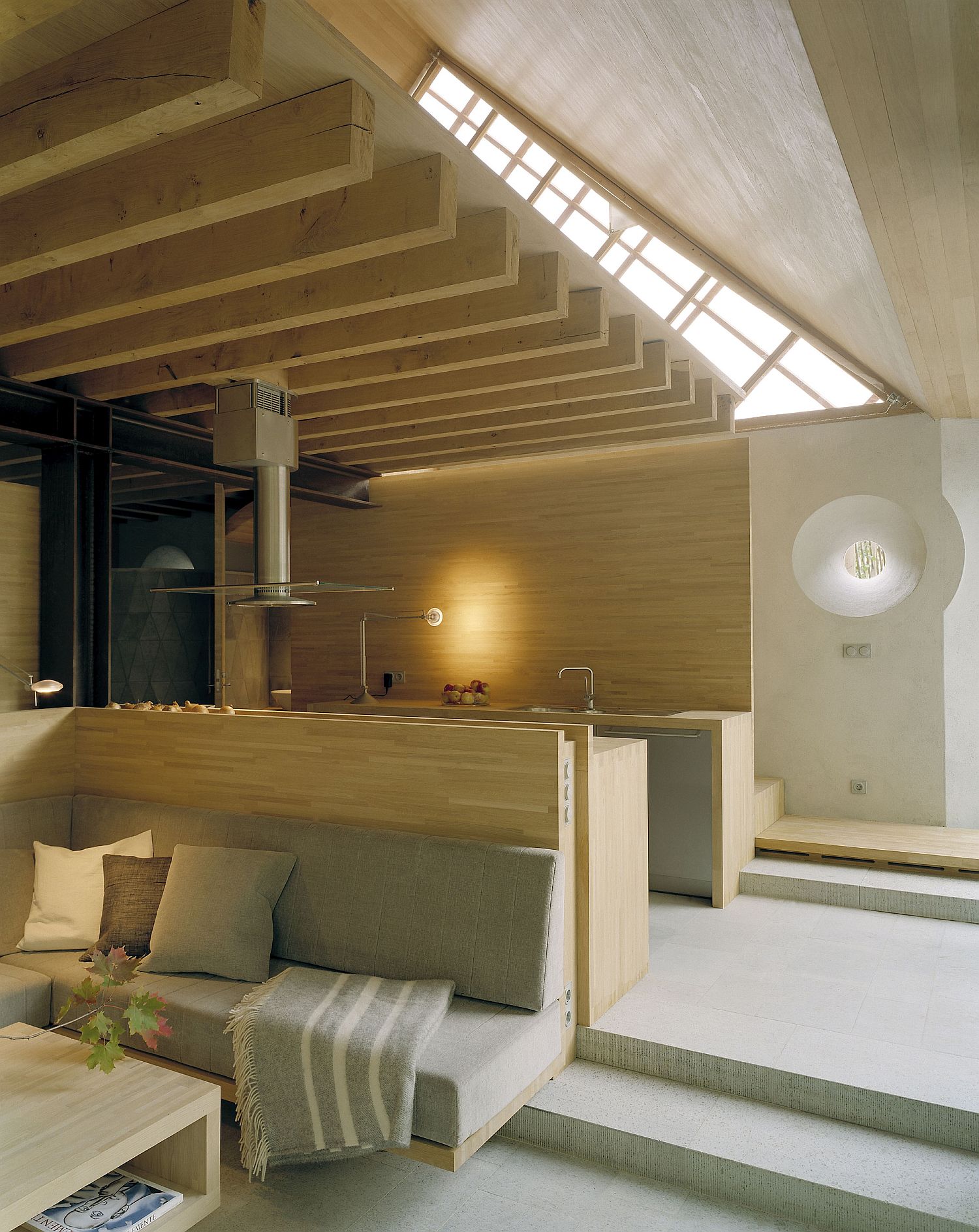 Spacious kitchen and interior of the Mill House with modern finishes and wood