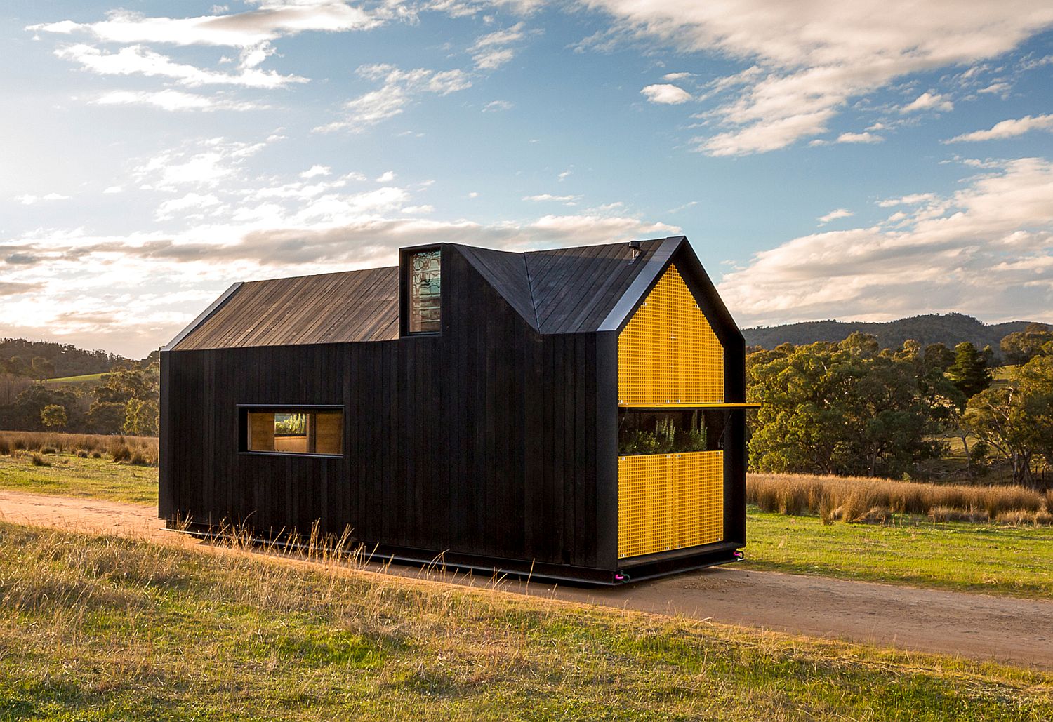 Spotted gum and gridded panel exterior of the small house