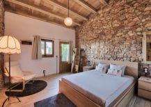 Stone-walls-give-the-rustic-bedroom-an-air-of-authenticity-217x155