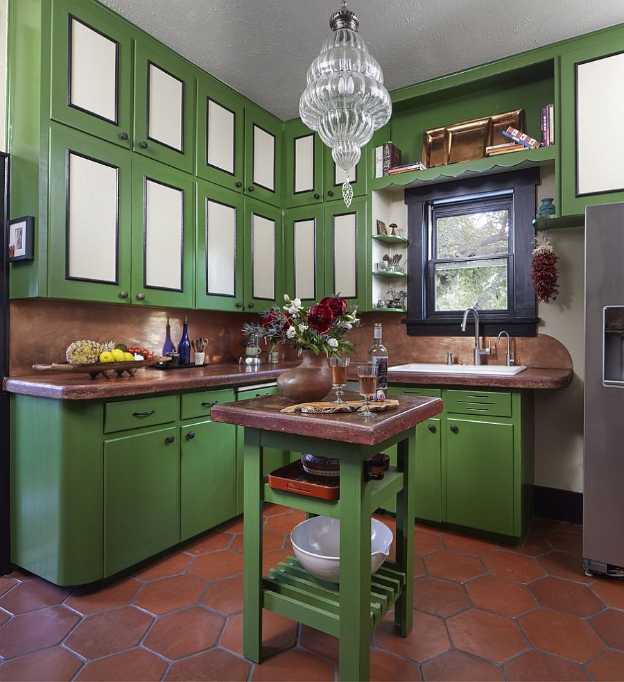 Terracotta tiles in the kitchen add classic touch to a space filled with ample green