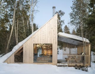 Woodsy Modern Micro-Shelter in Québec with Timeless Triangular Charm