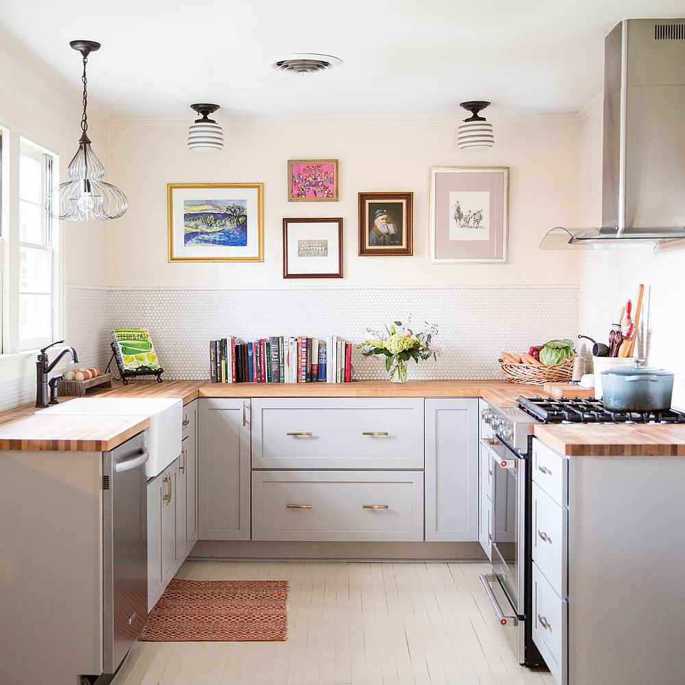 White farmhouse kitchen with wooden countertops and a simple gallery wall addition