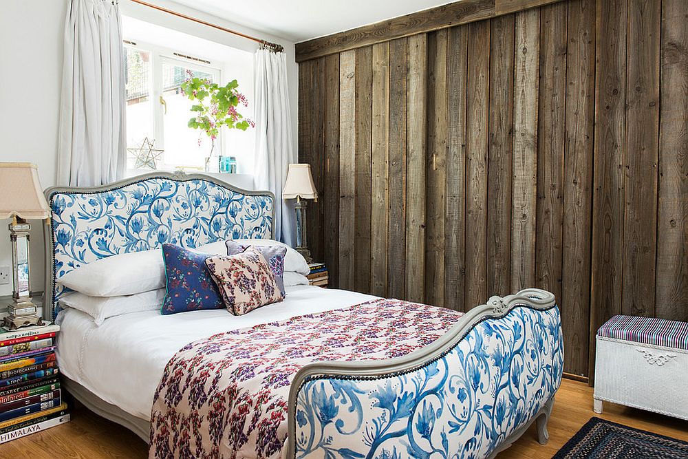 Bed frame and bedding brings flowery pattern to the bedroom