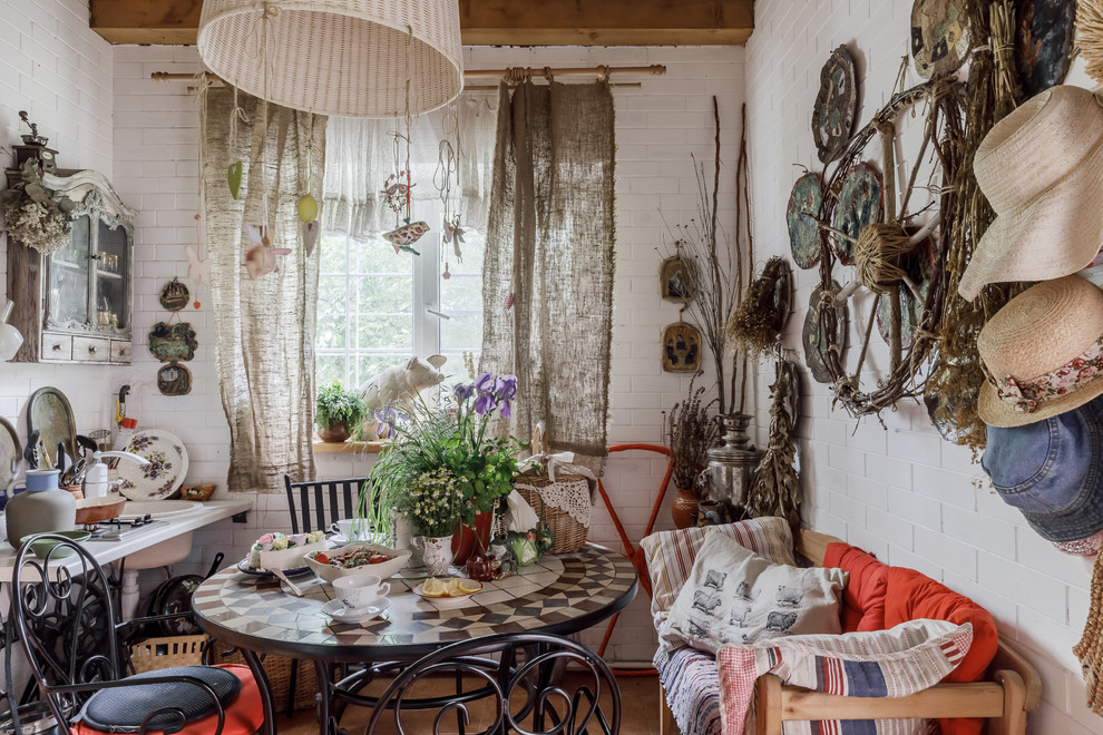 Casual shabby chic style dining room with a bit of eclectic appeal