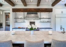 Ceiling-beams-bring-visual-contrast-to-the-kitchen-in-white-217x155