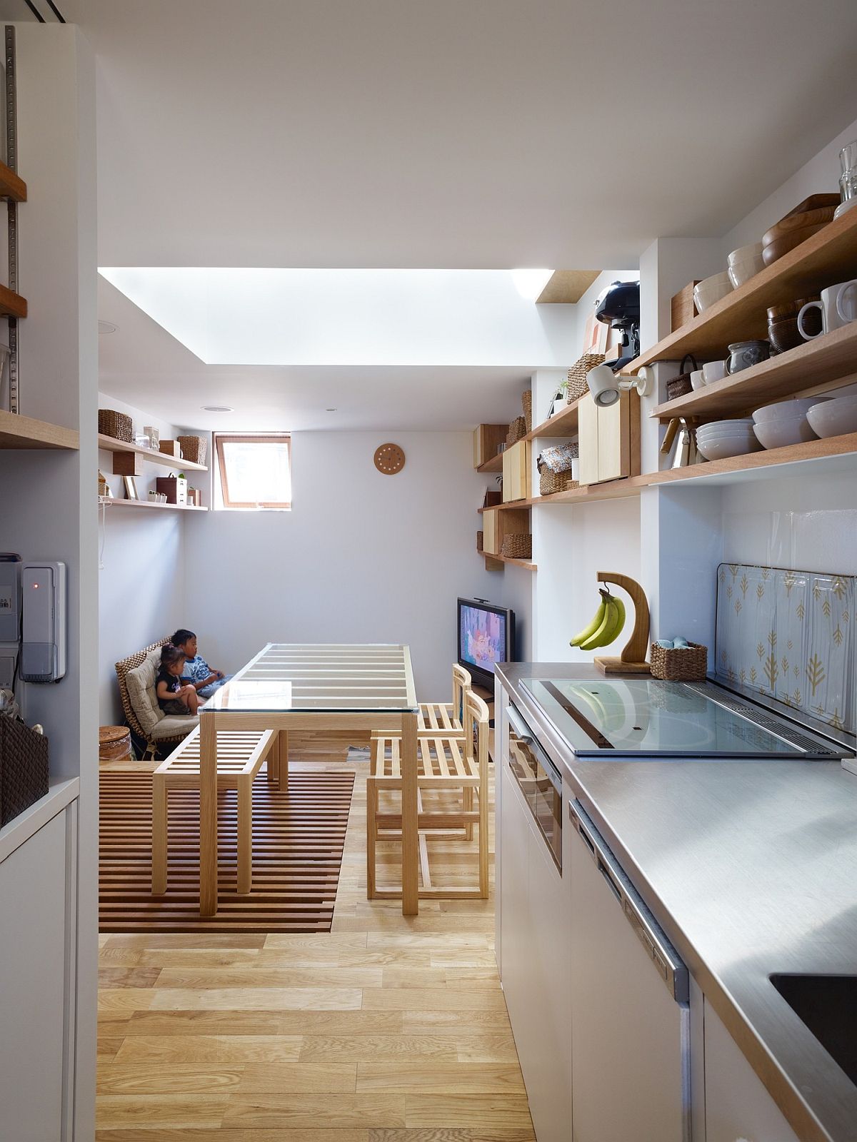 Daytime sees a flood of natural light flow into the living area