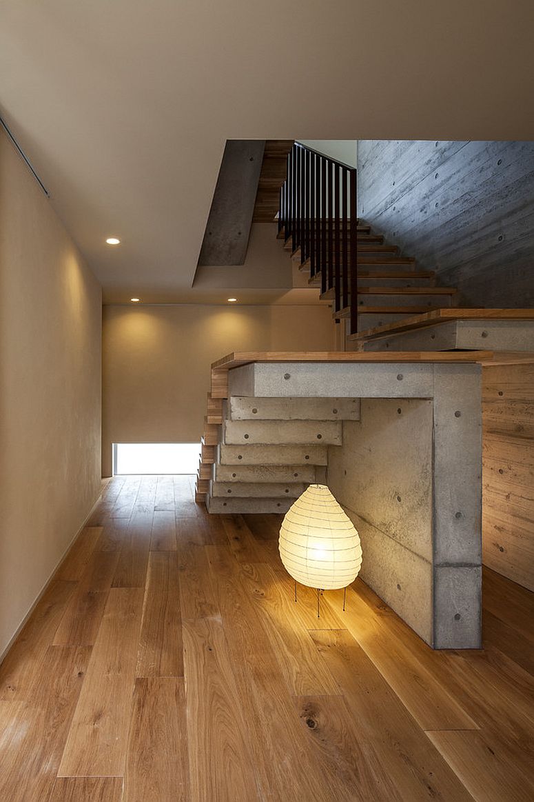 Fabulous contemporary lighting under the stairway makes a big visual impact