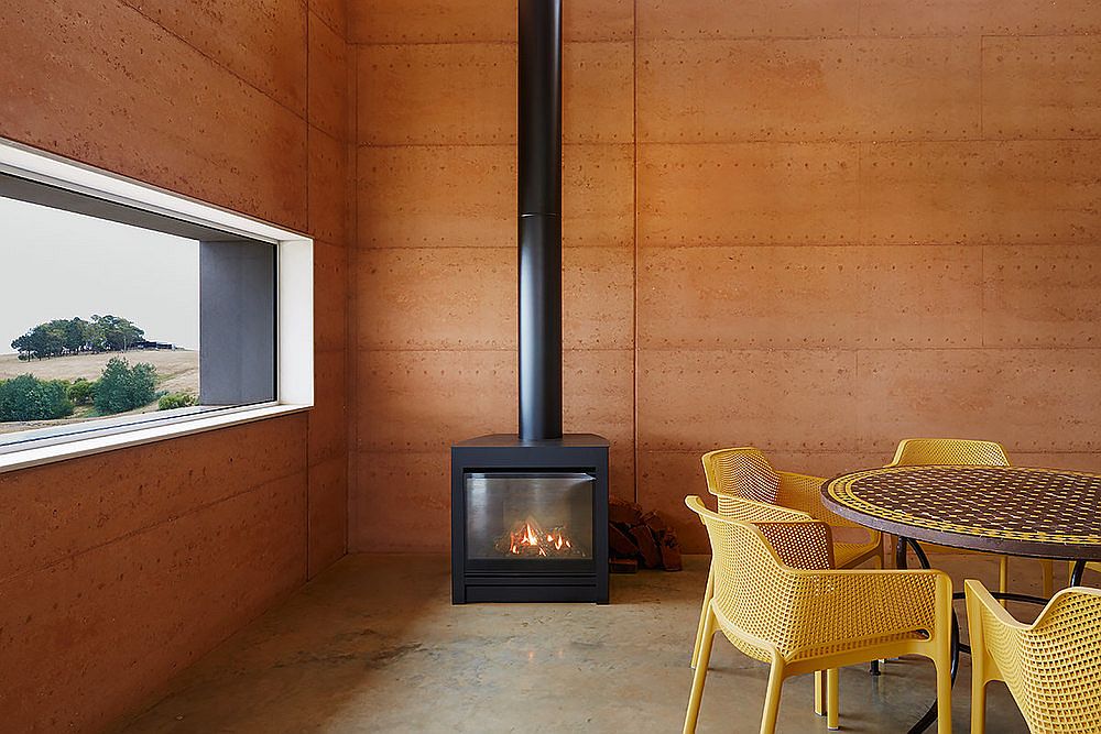 Fireplace in the corner of the winery adds warmth to the setting