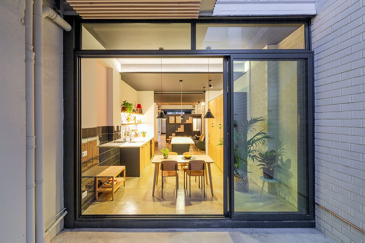 Framed-sliding-glass-doors-connect-the-interior-with-the-outdoors
