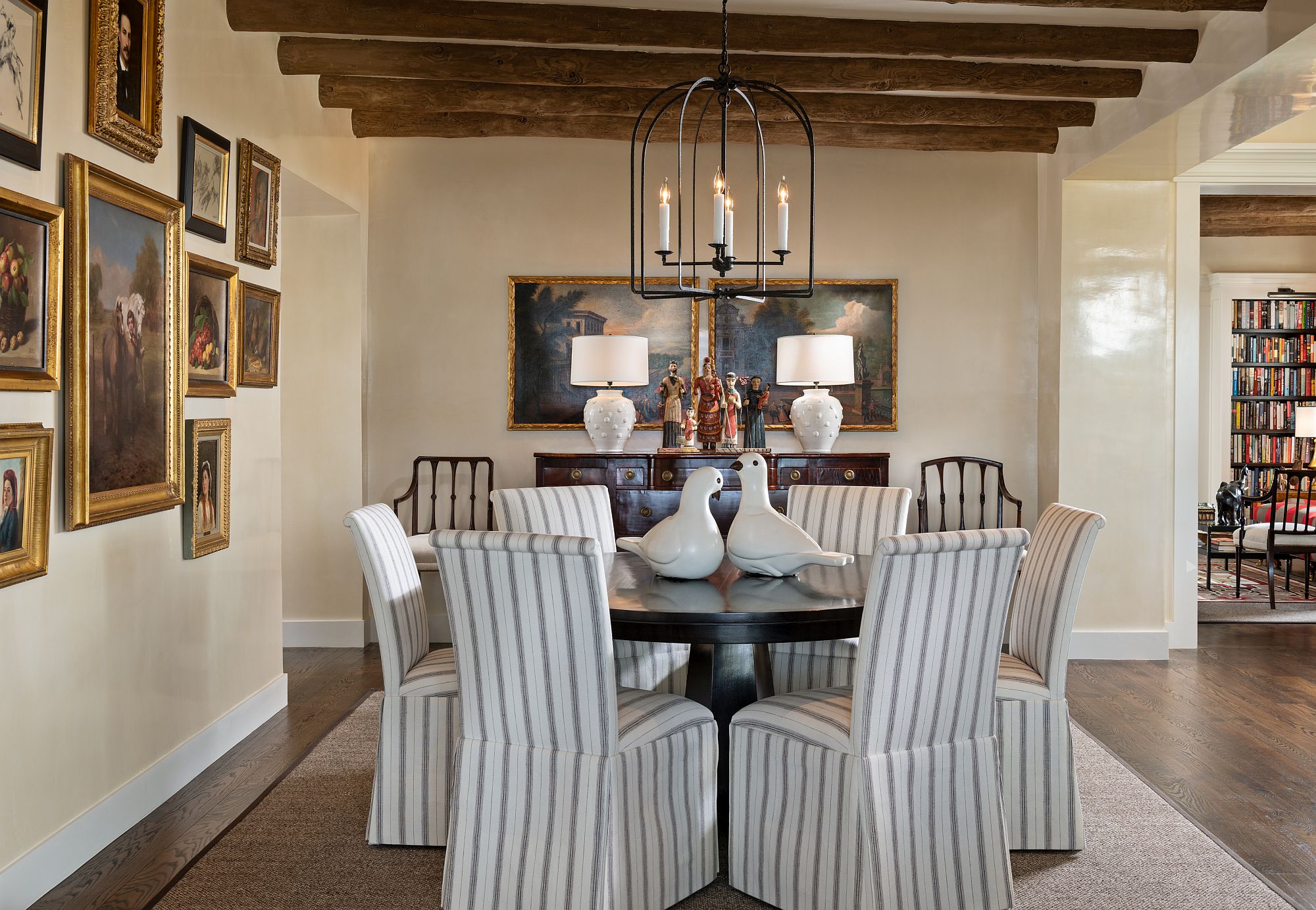 Gallery wall adds character to the dining space