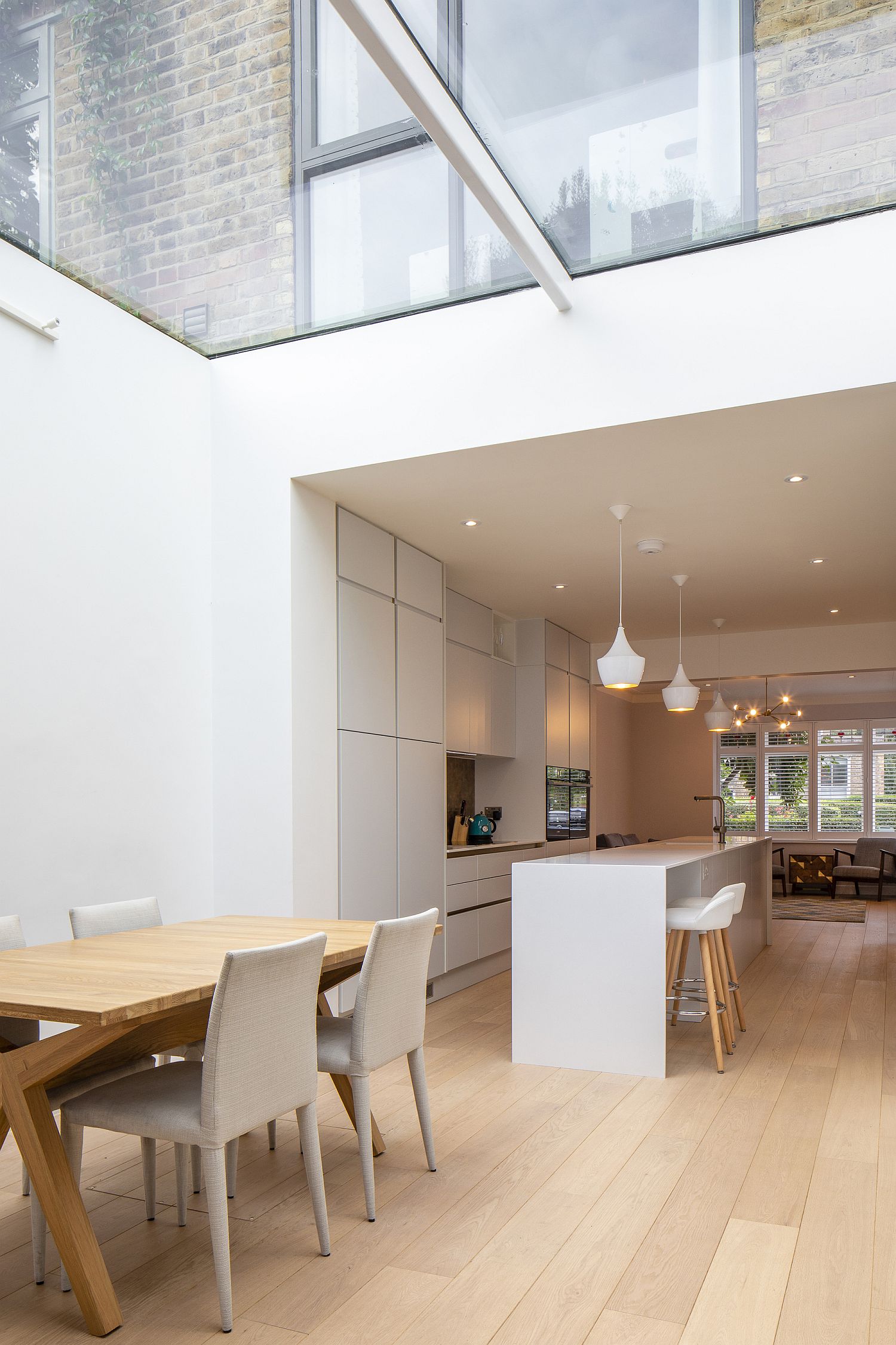 Glass-ceiling-and-doors-bring-light-into-the-new-kitchen-and-dining-room