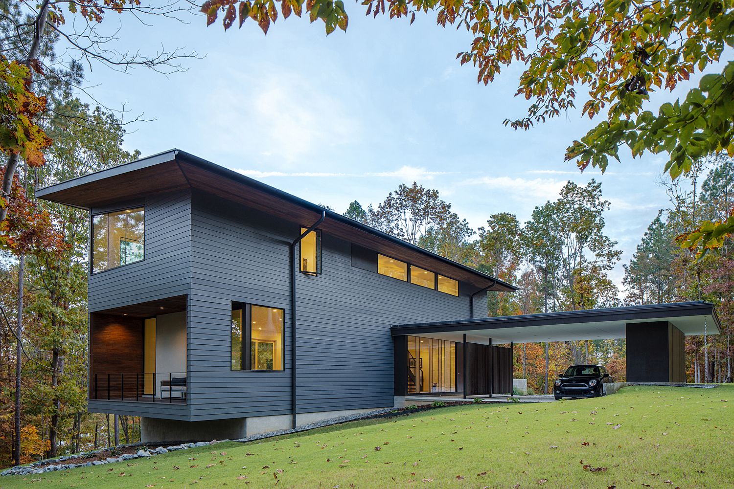 Gorgeous gray exterior of Merkel Cooper Residence in Troutman, North Carolina