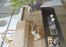 Gravel-filled-central-area-along-with-greenery-inside-the-house-217x155