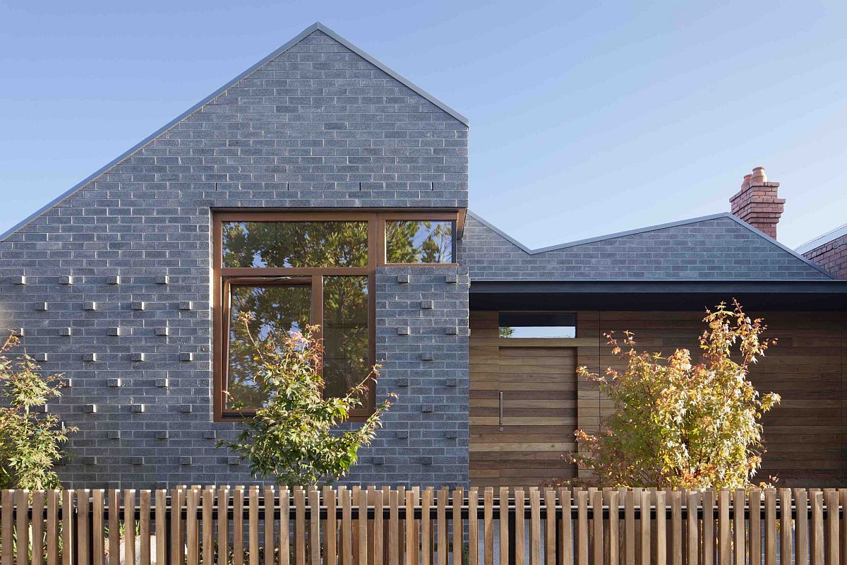 Gray tiled exterior of the house gives it a unique appeal without trying too hard